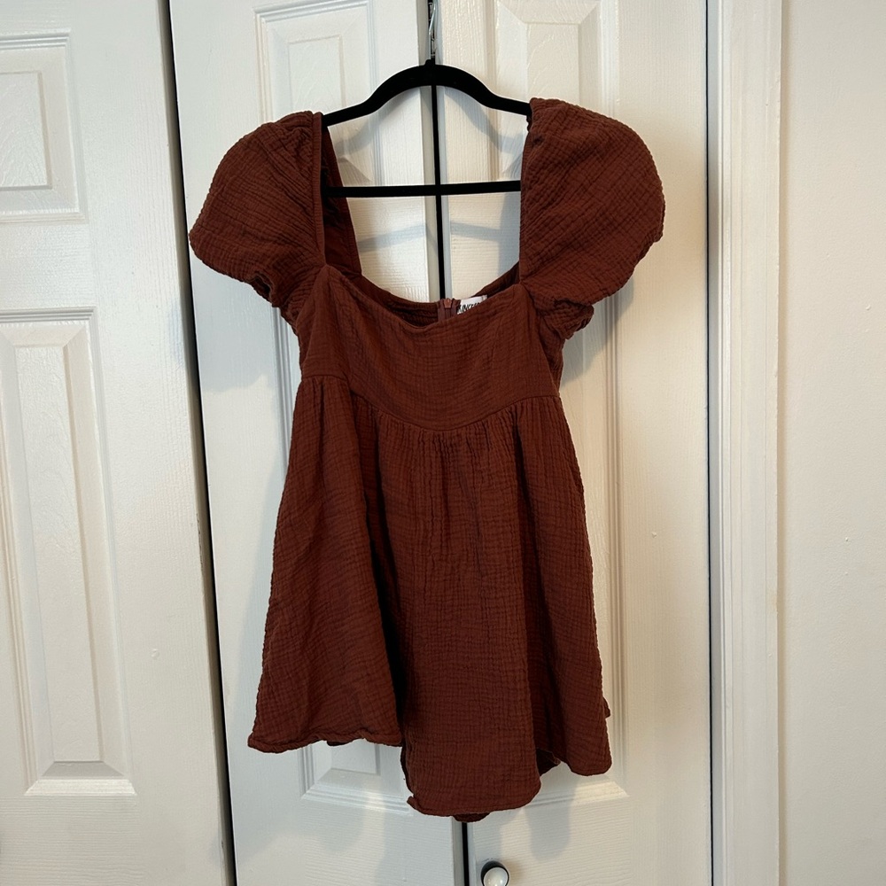 Princess Polly brown romper. Size US 4. Puffy sleeves sure comfortable